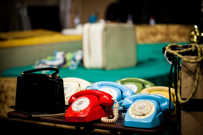 Close up of telephone props backstage