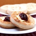 Crumpets with butter and jam